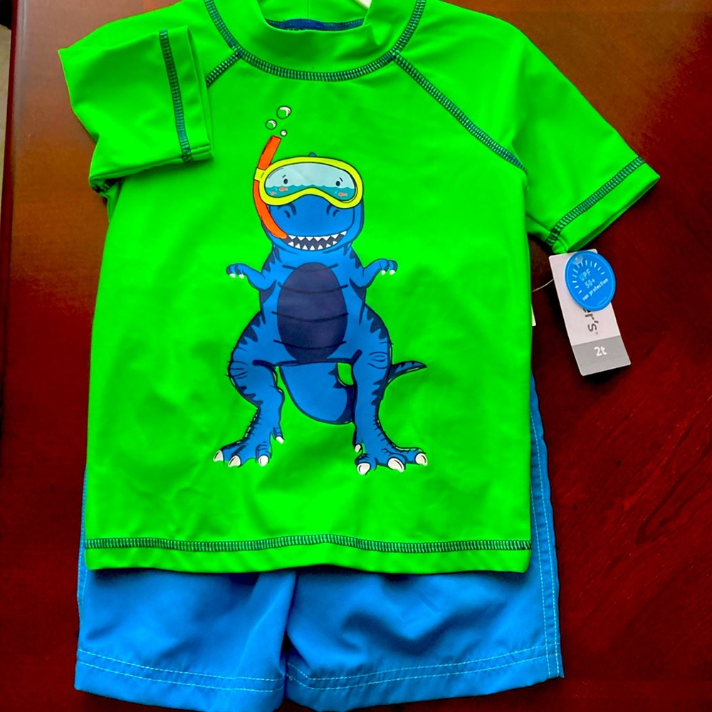 Carter’s 2T boys rash guard and swim shorts.